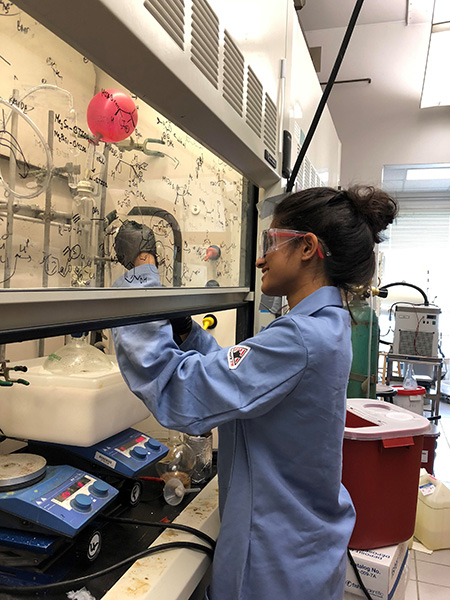 Chemistry senior Sriya Chitti conducts reserach in Martin Burke's lab. (Image courtesy of Sriya Chitti.) 